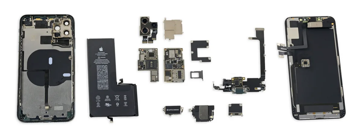 Replacement phone screens and parts laid out