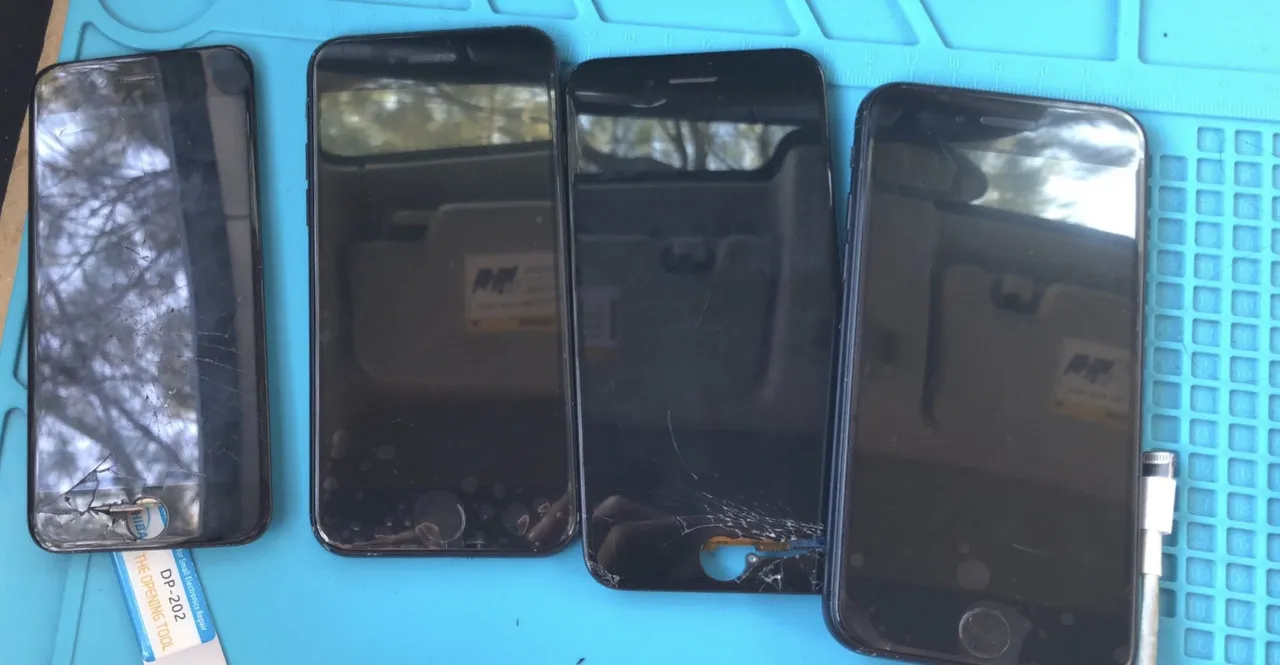 Cracked iPhone screen being repaired